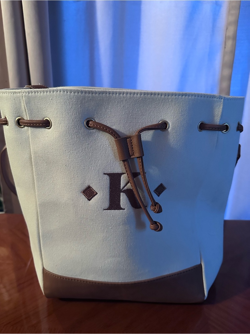 Canvas monogrammed K tote with man made straps